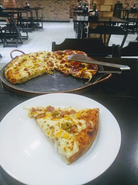 Foto 1 P Pizzaria