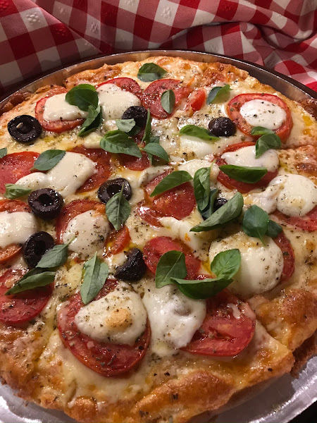 Foto 1 Romana Pizzaria