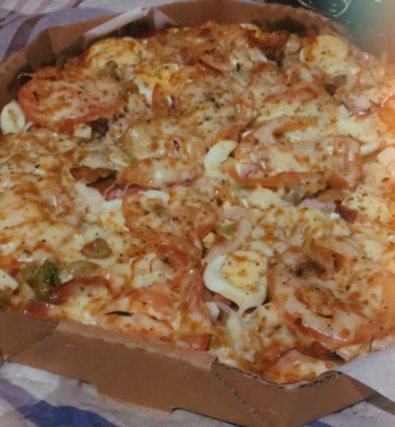 Foto 2 Manucas Pizzaria