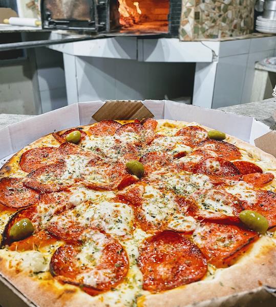 Foto 3 Pizzaria Oásis forno a lenha