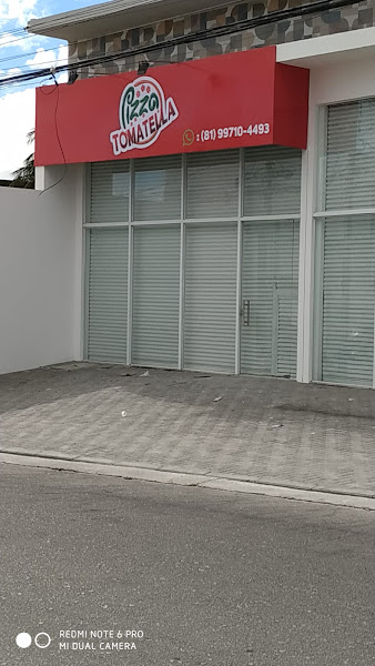 Foto 0 Pizza Tomatella