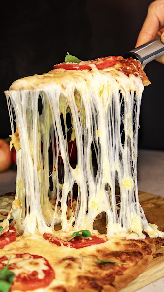 Foto 1 Pizzaria Magnata